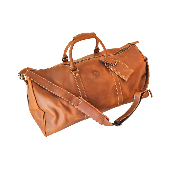 The Hinterland Genuine Leather Duffle Bag - Angled image - tan leather